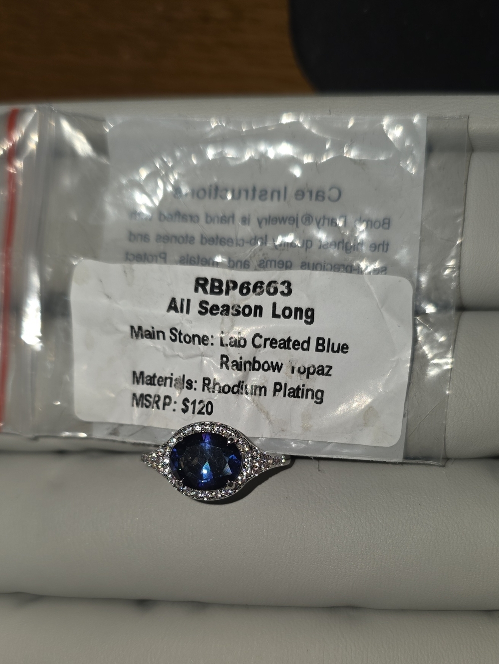 Blue Lab-Created Topaz Halo Ring with Rhodium Plating